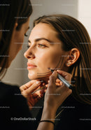 Close-Up of Woman Receiving Facial Markings by Makeup Artist