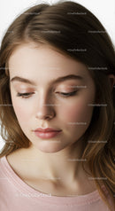 Beauty Portrait of a Young Woman with Natural Makeup and Brown Hair