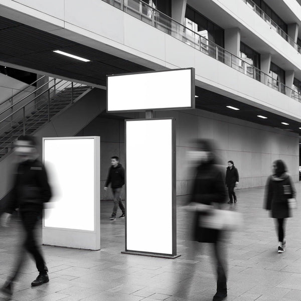 Urban scene with blank advertising panels and pedestrian blur JPG Mockup Image