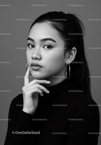Elegant Young Woman Portrait with Confident Expression for Fashion and Beauty