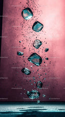 Falling Ice Cubes with Water Splash in Cold Refreshing Drink