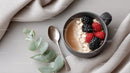 Fruit Topping on Coffee Smoothie Bowl in Ceramic Mug