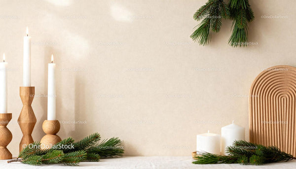Minimalist Christmas candles with green pine branches