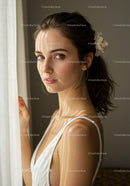 Portrait of a Young Woman with Blue Eyes Near a Window