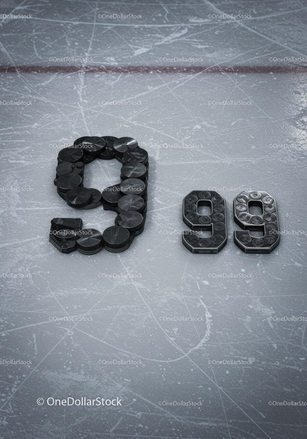 Hockey Pucks Arranged as Numbers on Ice Rink Surface