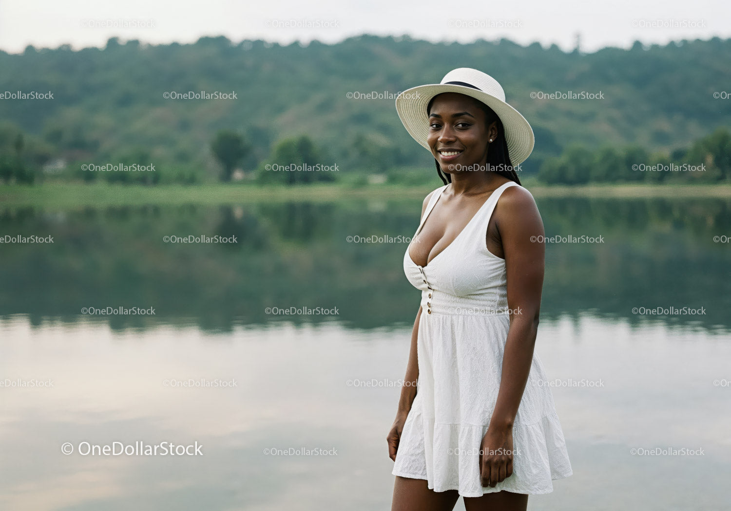 Beautiful Woman in White Dress with Wide-Brim Hat by Lake