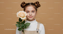 Young Girl with Pale Peach Rose Portrait on Soft Beige Background