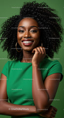 Stunning Smiling Woman with Curly Hair in Green Dress for Stock Photography