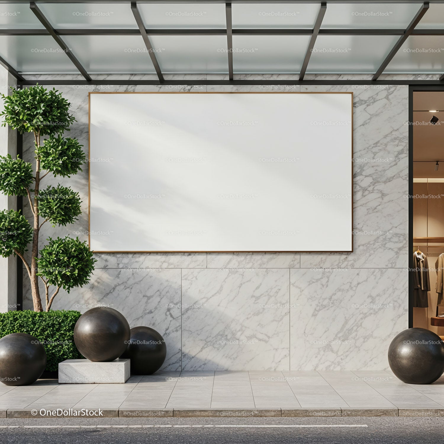 Modern urban facade with blank marble wall and greenery