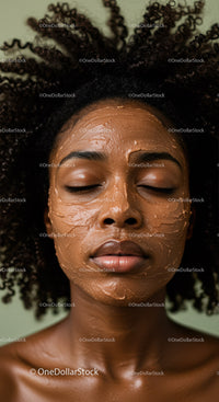 Young Woman Relaxing with Clay Face Mask in Spa Setting
