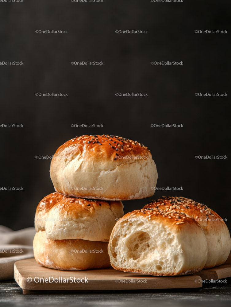 Freshly Baked Bread Rolls on Wooden Board