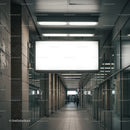 Modern urban corridor with illuminated blank billboard