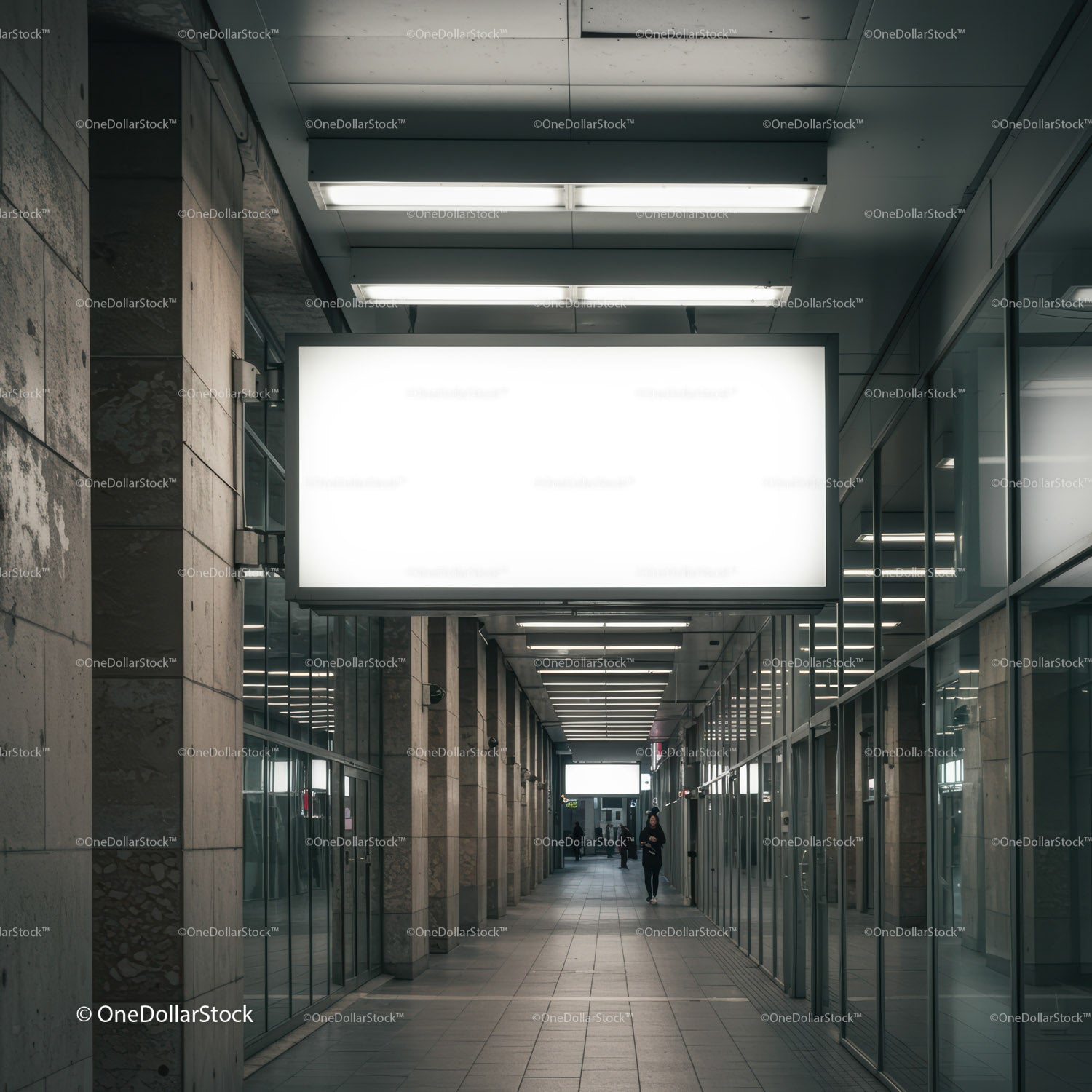 Modern urban corridor with illuminated blank billboard