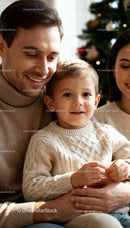 Smiling family enjoying cozy holiday moment indoors