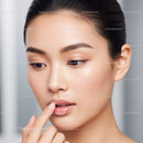 Elegant Young Woman with Flawless Skin and Natural Makeup Close-Up