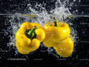 Yellow Bell Peppers in Water Splash for Fresh Food Advertising