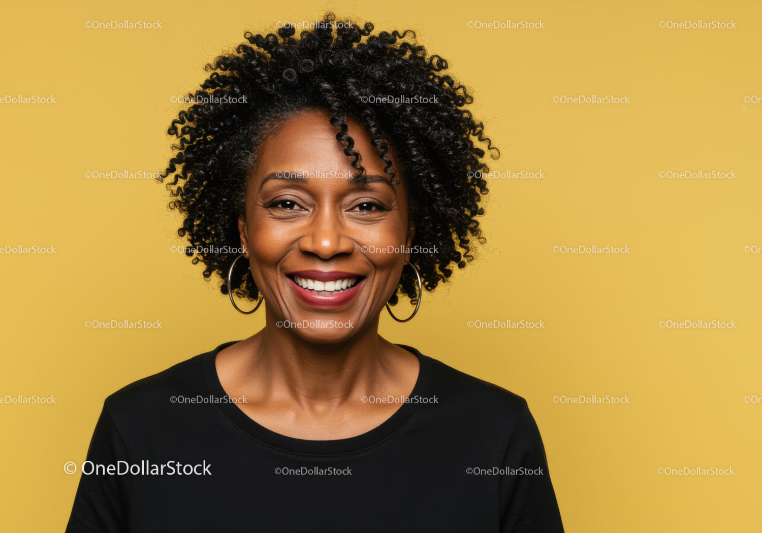 Smiling African American Woman with Curly Hair on Bright Yellow Background