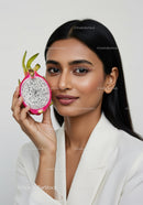 Beautiful Woman Holding a Dragon Fruit for Healthy Skin and Wellness
