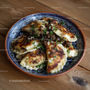 Dumplings with Bacon and Herbs Served in Rustic Bowl