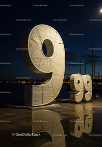 Illuminated Giant Number Installation Near Waterfront At Night
