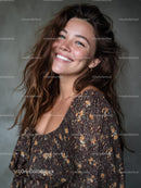 Bright Smiling Woman in Floral Dress with Joyful Expression