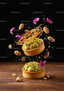 Pistachio tarts with caramel and rose petals in motion