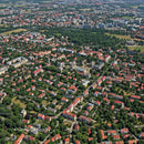 Aerial View of Green and Red Roofs in Urban Residential Neighborhood