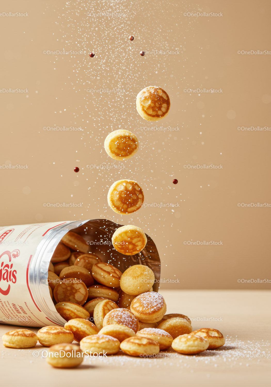 Small pancake cereal spilling out of package with powdered sugar