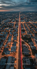 Aerial View of a Vibrant City at Night with Illuminated Streets