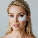 Young Woman with Blue Eyes in Facial Mask for Skin Care