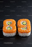 Sushi Rolls Shaped Like Number Eight On Black Surface