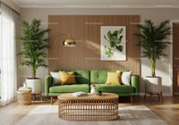 Bright living room with green sofa and natural accents