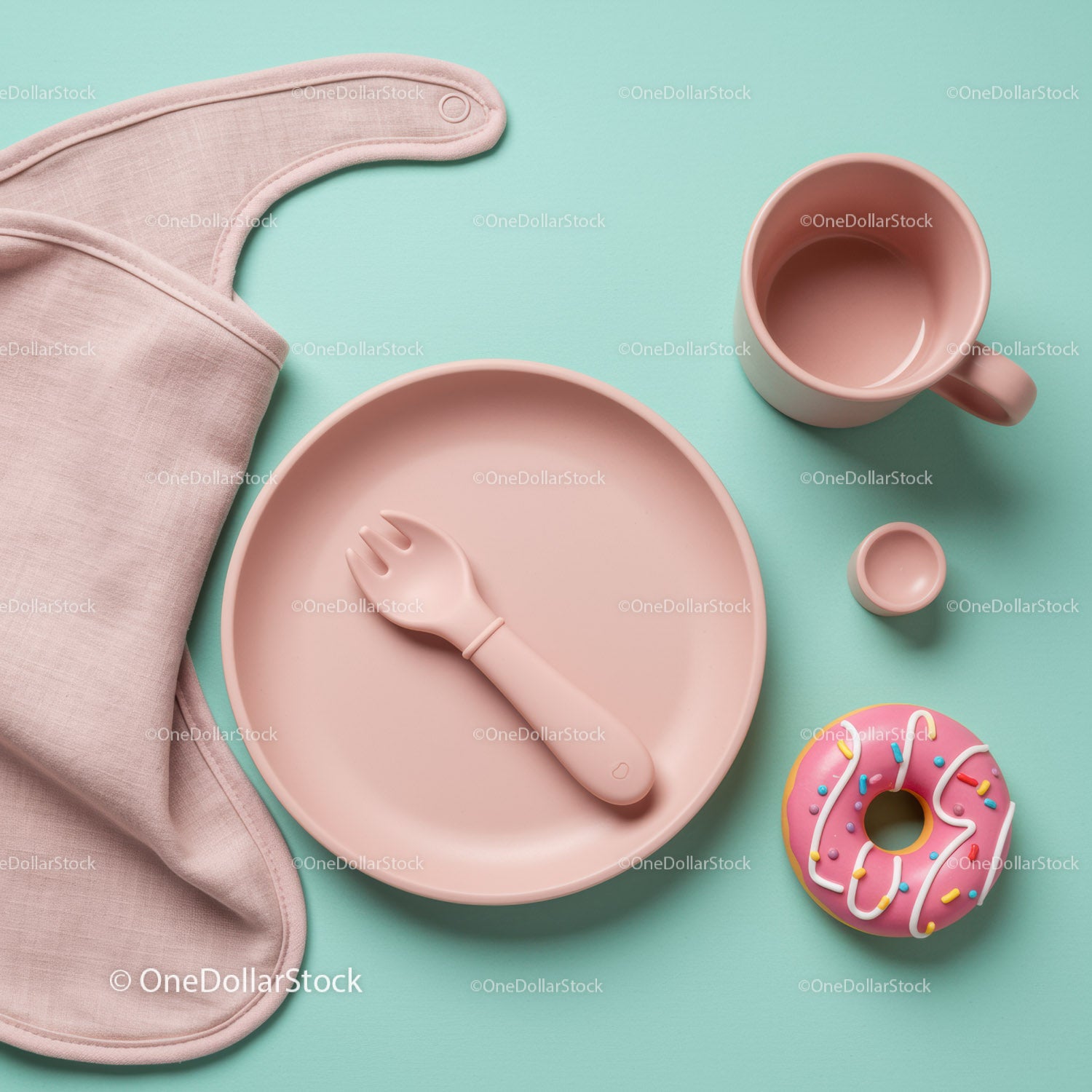 Minimalist Baby Feeding Set with Donut Toy on Blue