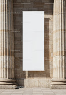 Blank White Banner Hanging Between Stone Columns
