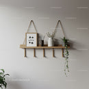 Elegant Wooden Wall Shelf with Plants and Decorative Vases