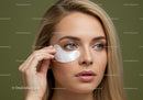 Woman Applying Eye Patches for Skincare Routine in Close-Up