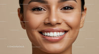 Close up of smiling woman with flawless radiant skin