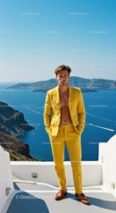 Man in Yellow Suit Standing by Seaside Cliffs on Sunny Day