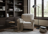 Cozy reading nook with armchair and large window
