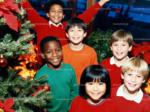 Happy children enjoying festive Christmas celebration indoors