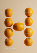 Fresh oranges arranged in letter H on beige background
