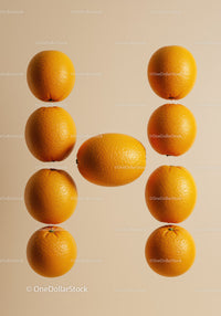 Fresh oranges arranged in letter H on beige background