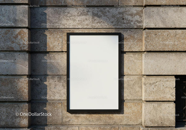 Blank poster frame on rustic stone wall outdoors JPG Mockup Image