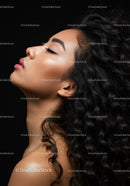 Profile of serene woman with flowing curly hair