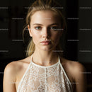 Elegant Young Woman in Lace Top with Youthful Glow