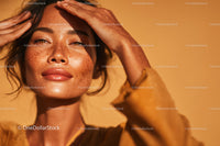 Freckled Woman Smiling in Warm Sunlight Outdoor Portrait