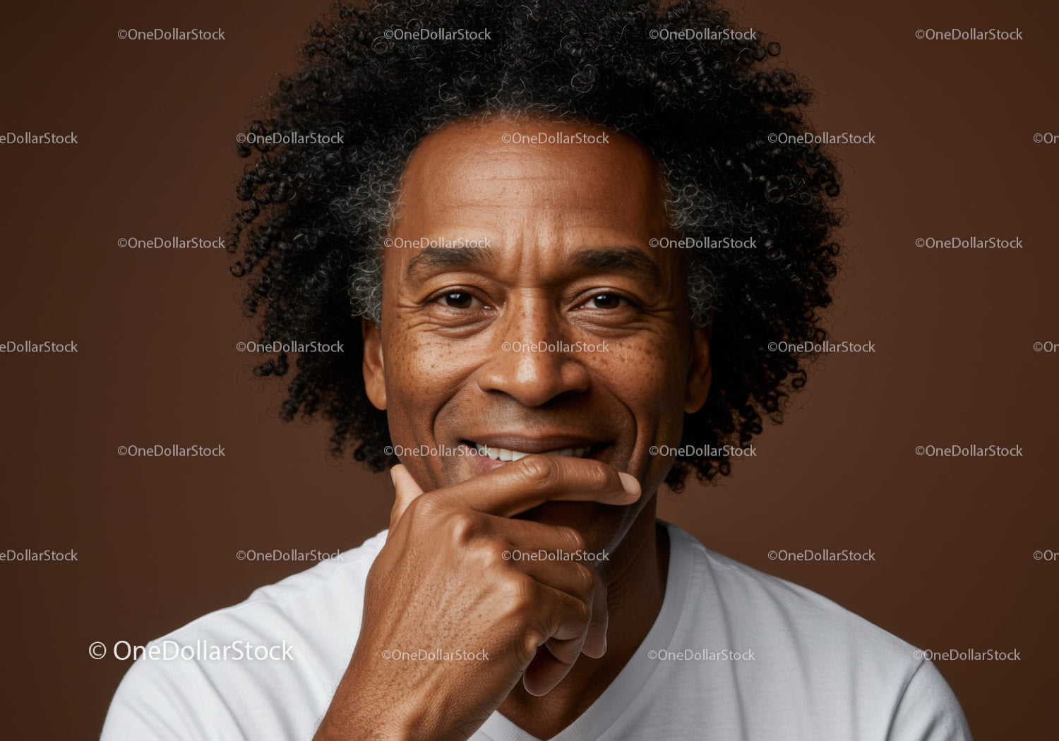 Confident Smiling Man Portrait with Curly Hair and Genuine Expression