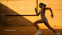 Athletic woman sprinting with powerful stride outdoors
