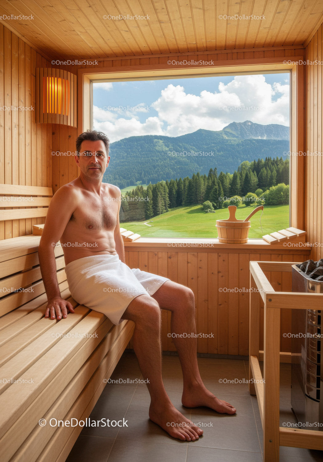 Man Relaxing in Sauna with Scenic Mountain View and Wooden Interior