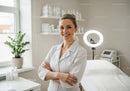 Smiling Woman Doctor in Medical Clinic with Modern Equipment and Natural Light